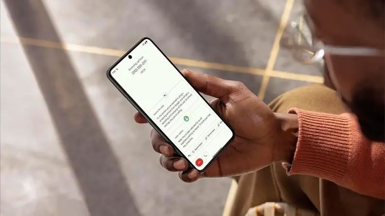 Person staring down their messages on the screen on their Google Pixel 8.