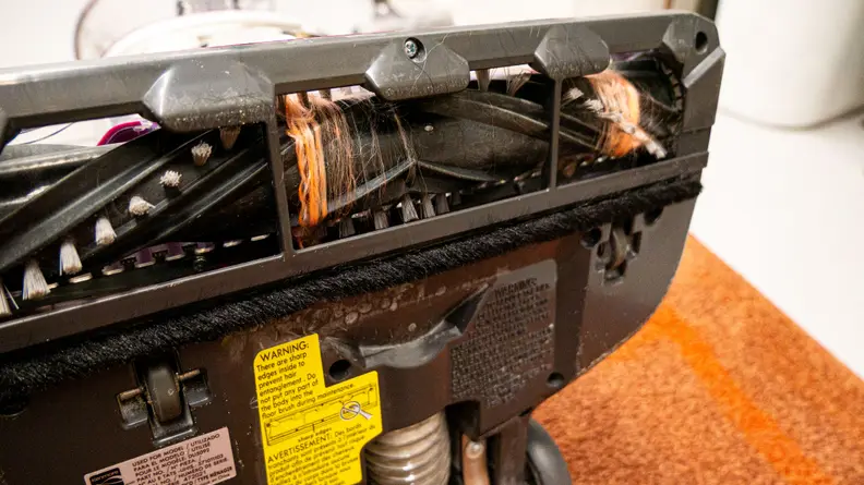 String wrapped around the brush roll of the DU5092