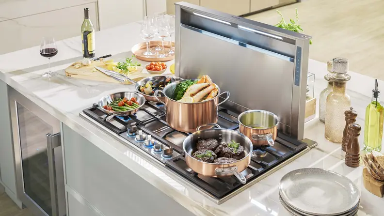 The Thermador range, installed in a modern kitchen with lots of homey decorations.