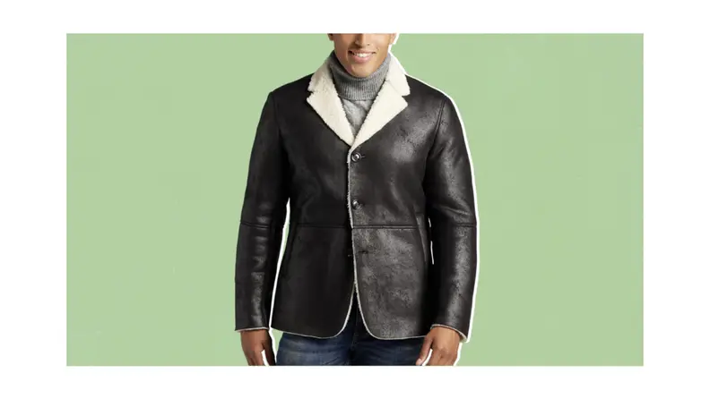 A model wearing a shearling blazer.