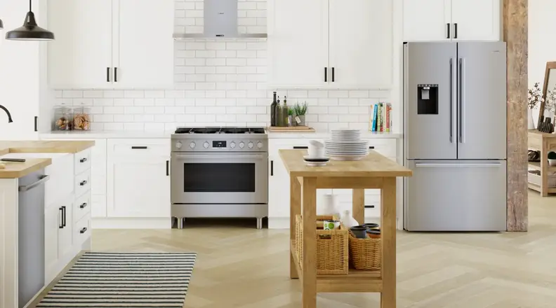 A designer kitchen featuring stainless steel appliances