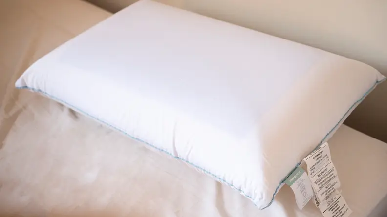 the tempur-cloud dual breeze on a bed
