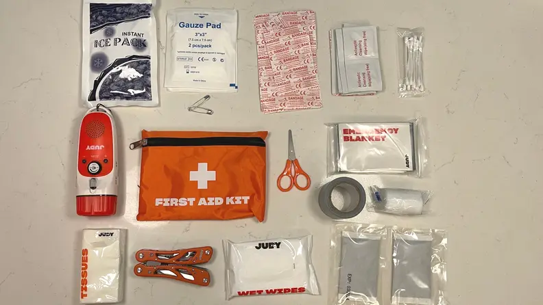 Here are some of the items, like bandages, a radio, and first aid kit, that come inside of the Judy Mover Max Kit.