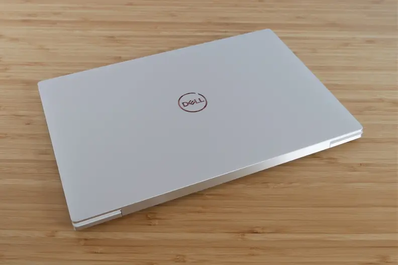 A close laptop on top of a table.