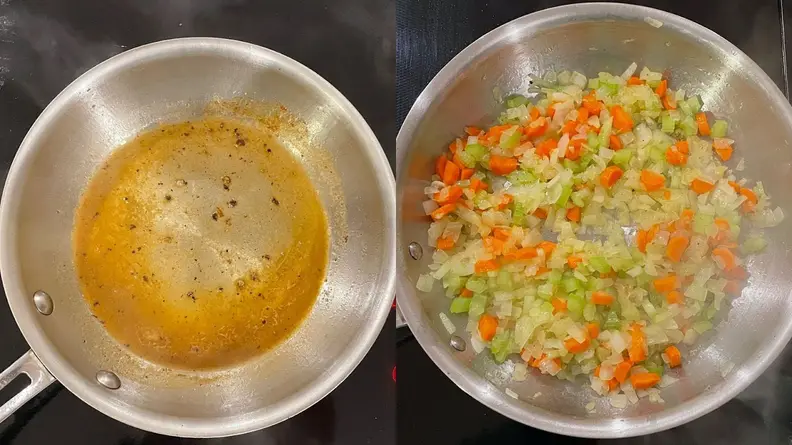 Diced vegetables and broth sitting inside of stainless steel sautée pan.