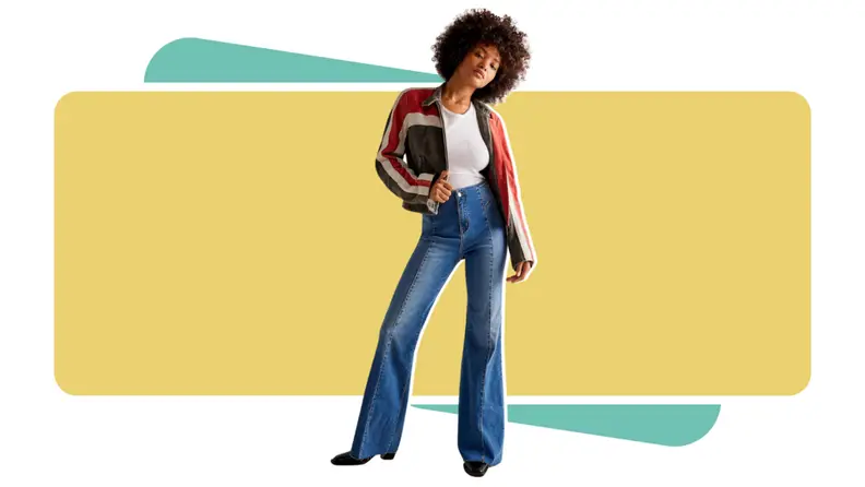 A woman wearing Free People flare jeans.