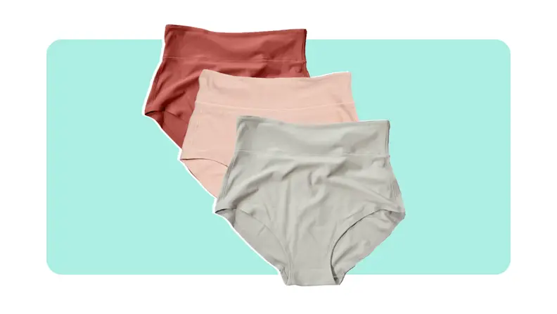 Product shot of three multicolored high-waisted maternity underwear.