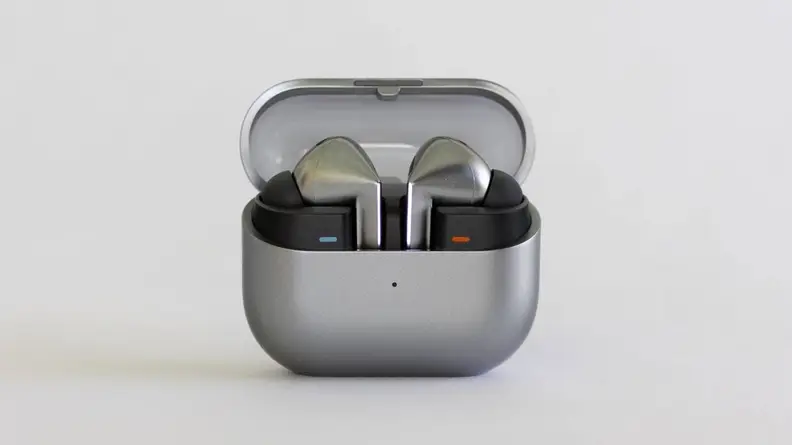 The Samsung Galaxy Buds3 Pro earbuds inside of its charging case with the lid open.