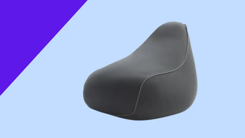 A gray bean bag on a blue background