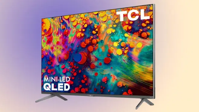 Smart tv with display on in front of colorful background.