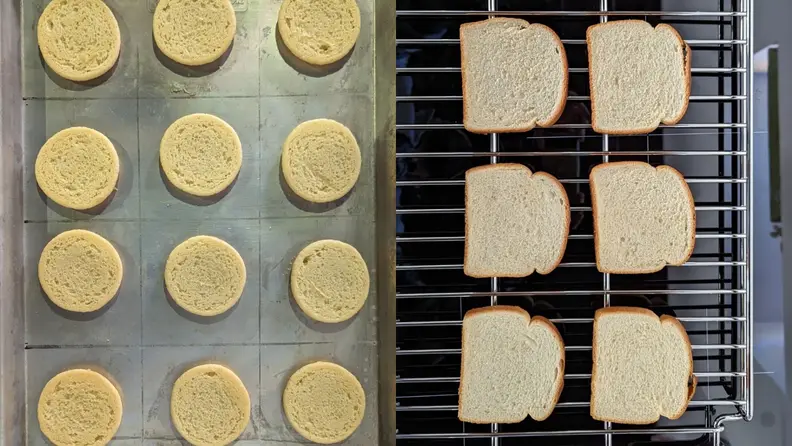 Pieces of bread and dough being cooked on the range.