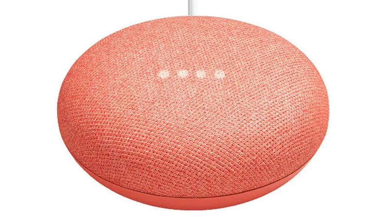 A coral Google Home smart speaker