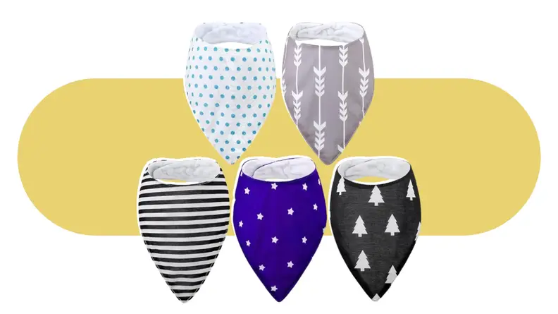 A collection of Janmercy bibs in various patterns on a colorful background.