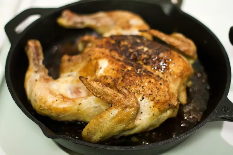 cast iron skillet with chicken