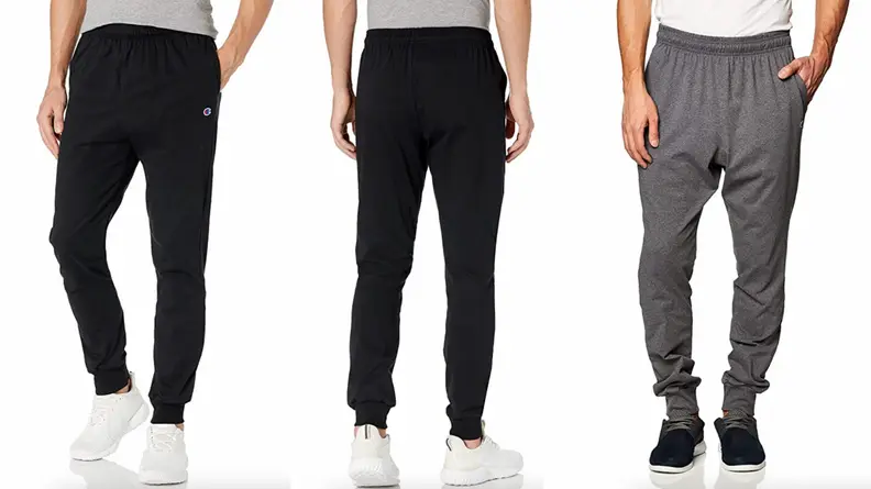 Man wearing black Champion jogger pants, man wearing grey Champion jogger pants.