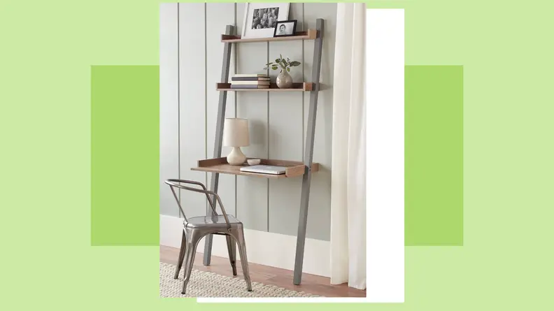 Leaning desk and chair placed against wall in residential home.