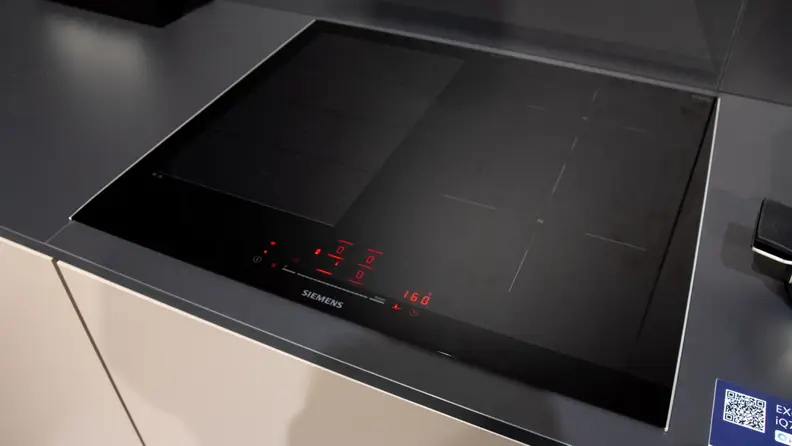 A full-sized induction cooktop cooktop with digital display.
