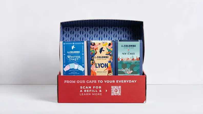 A photo of La Colombe's box filled with three varieties of coffee.