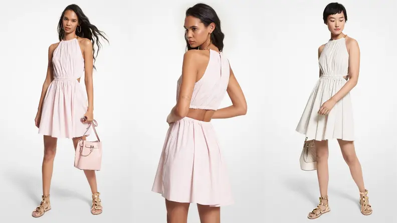 A halter neck and open back give this dress a flirty vibe.
