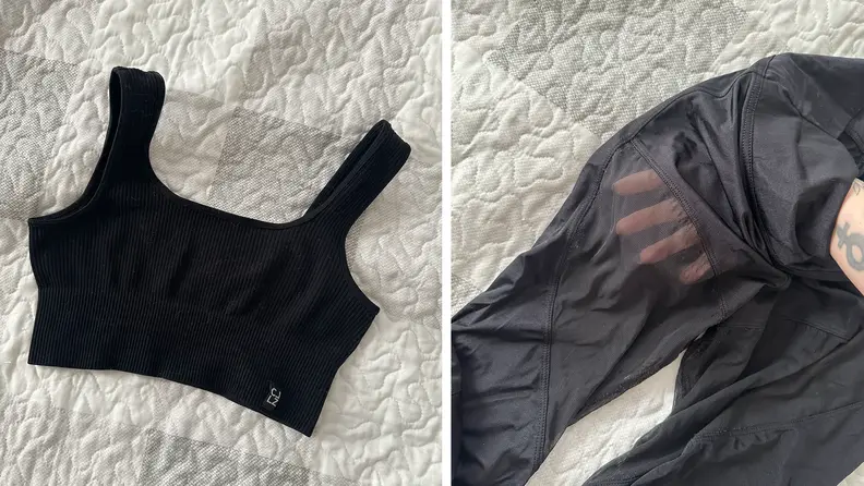 A black sports bra laying on a white bed, and also a shot of black leggings with the author’s hand showing how sheer the material is.