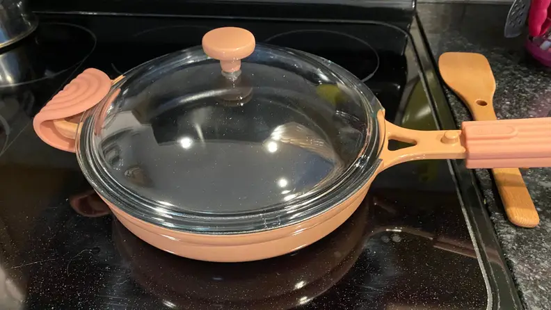 Close up of a pan with a glass lid.