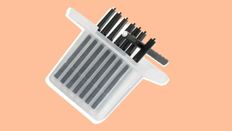 Clear case filled with Hearing aid Wax Guard Filter.