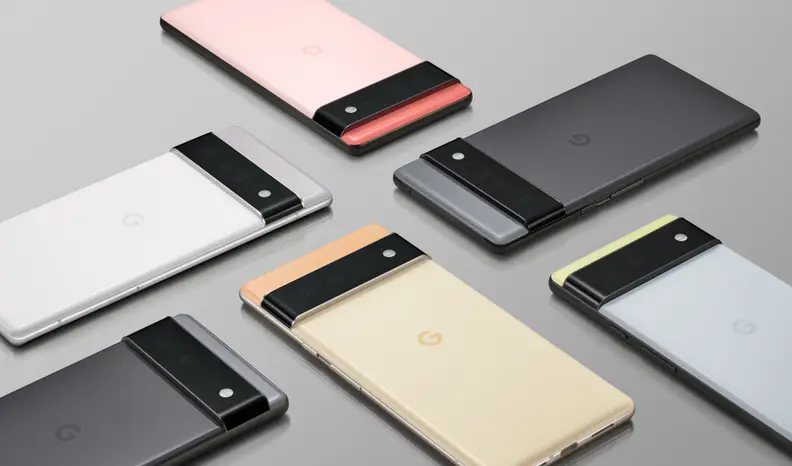 A group of Google Pixel 6 smartphones face down with various color platings.