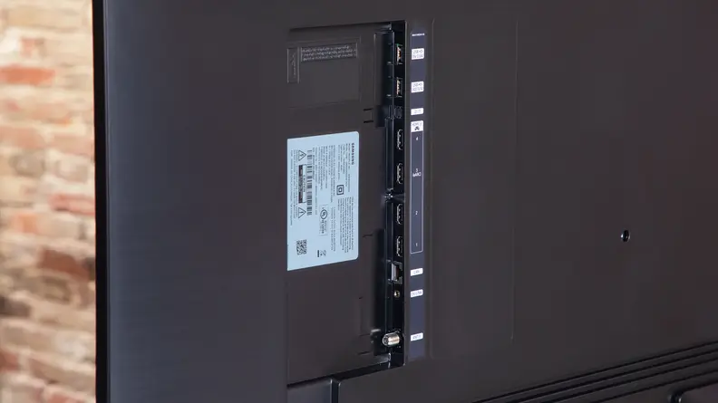Close up view of the side-facing cutout in the back of the panel of the Samsung QN90D Mini-LED TV.