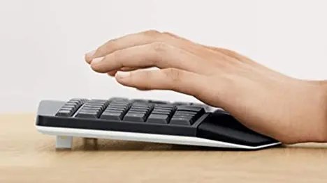 A hand on the Logitech MK850 Keyboard