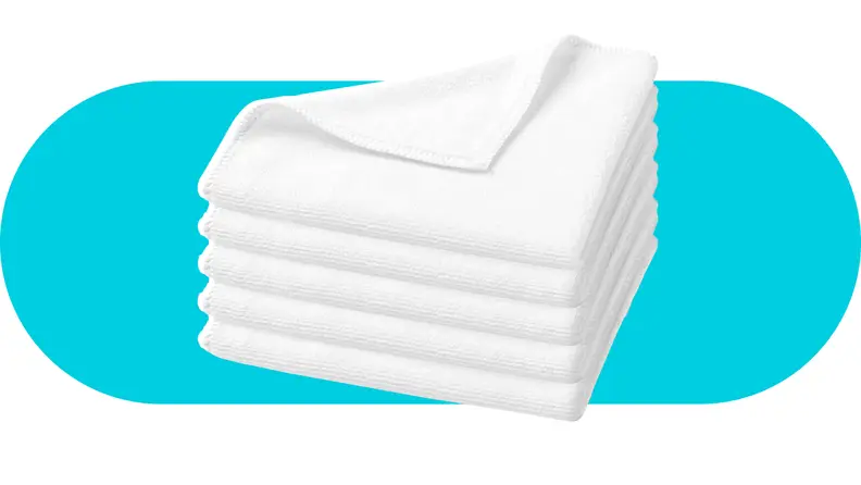 Stack of white terry washcloths.