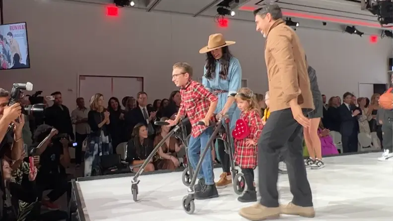 Fashion models showing off shirts and pants at the Runway of Dreams fashion show in New York City.