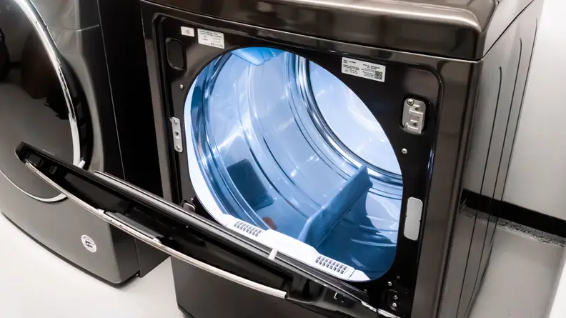 Here we can see the LG DLEX7900BE dryer's EasyLoad door opened from the top edge