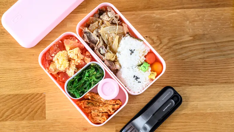 Each half holds about two cups of food—four total.