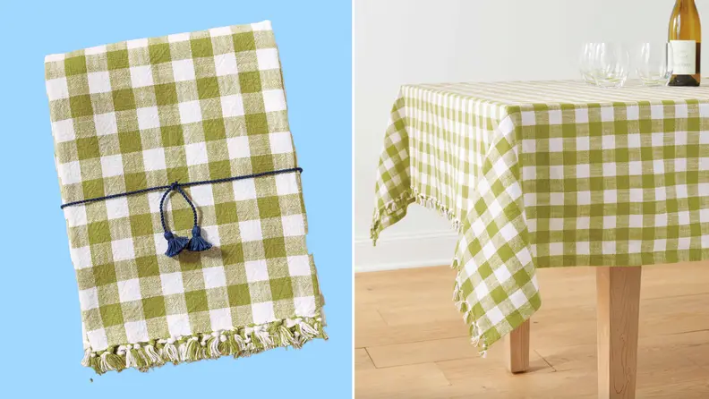 Product shot of gingham patterned green and white table cloth.