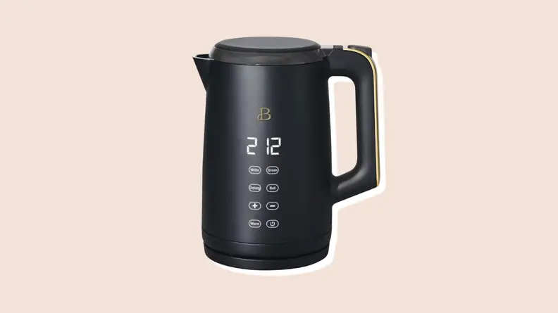 Product shot of black electric tea kettle from the Beautiful by Drew Barrymore Kitchen Appliances line.