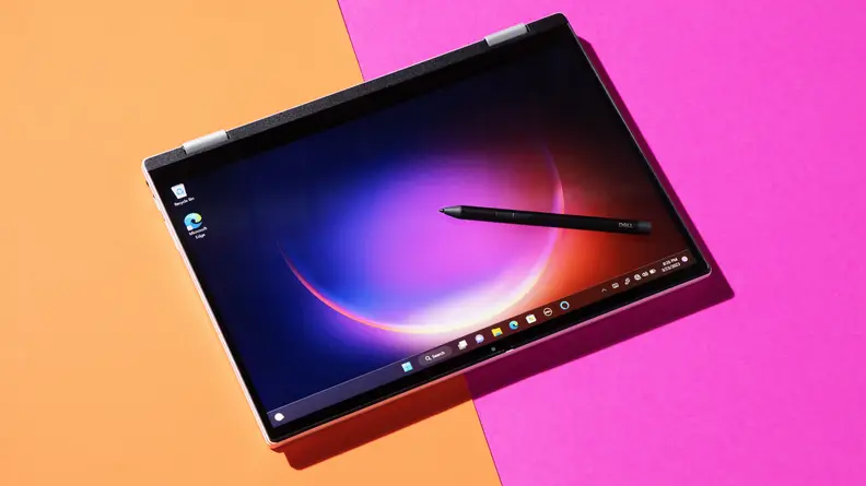 The Dell Inspiron 14 7420 in tablet form with a stylus rest on its screen.