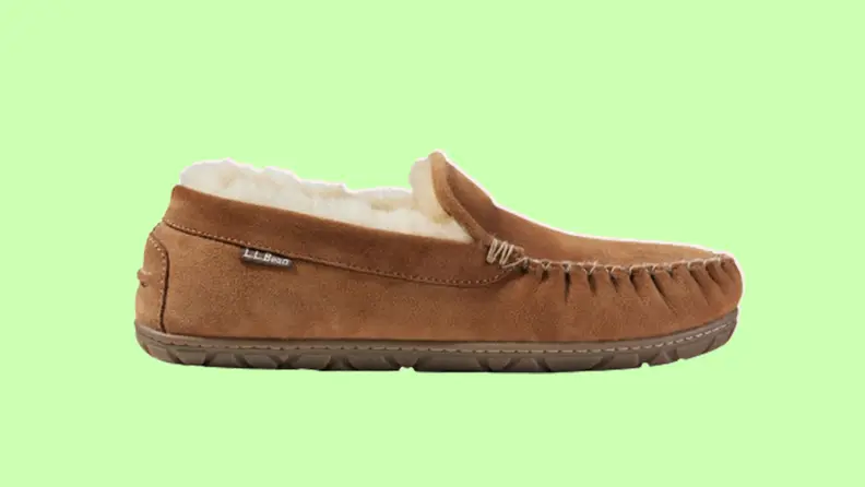 L.L. Bean men's wicked good slippers on a light green background