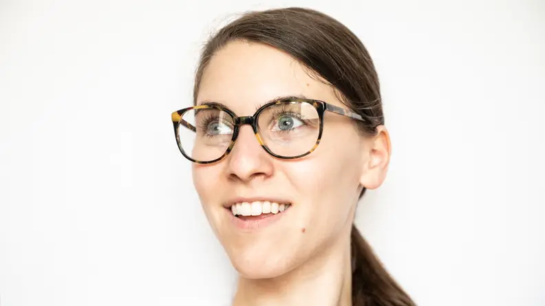 Betsey wearing Warby Parker