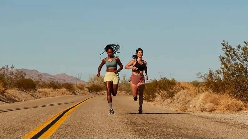 Women running in desert in lululemon airsupport bras