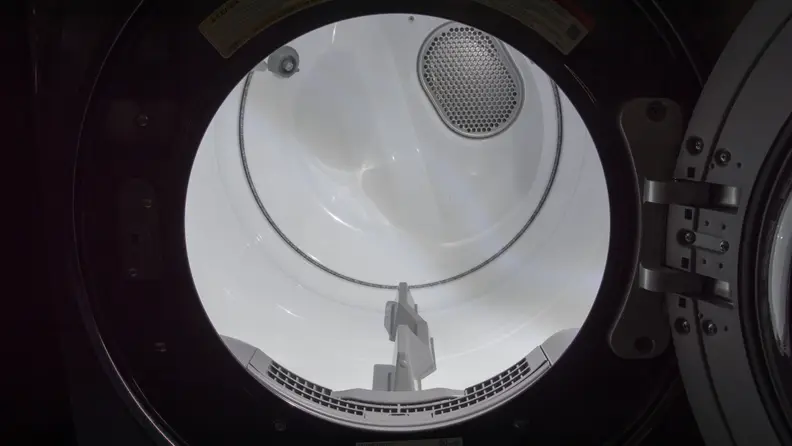 The drum is spacious, white, and brightly lit