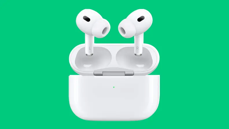 Apple airpods pro in case on green background.