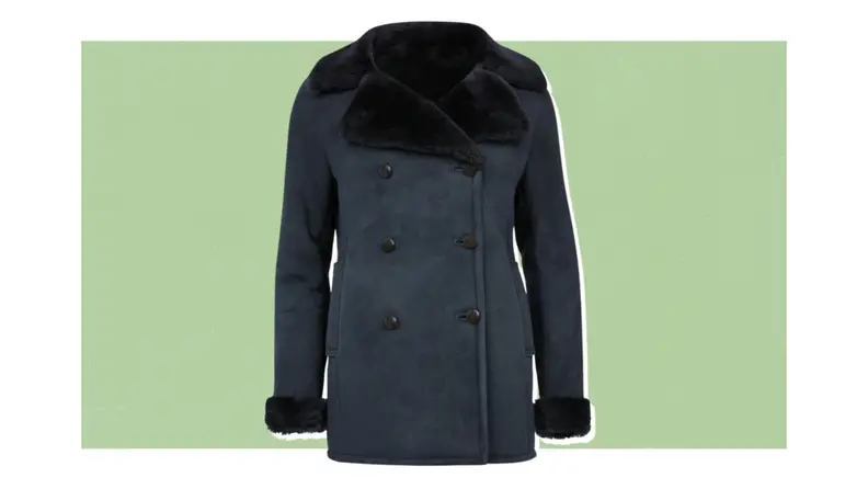 A navy peacoat-style shearling coat.