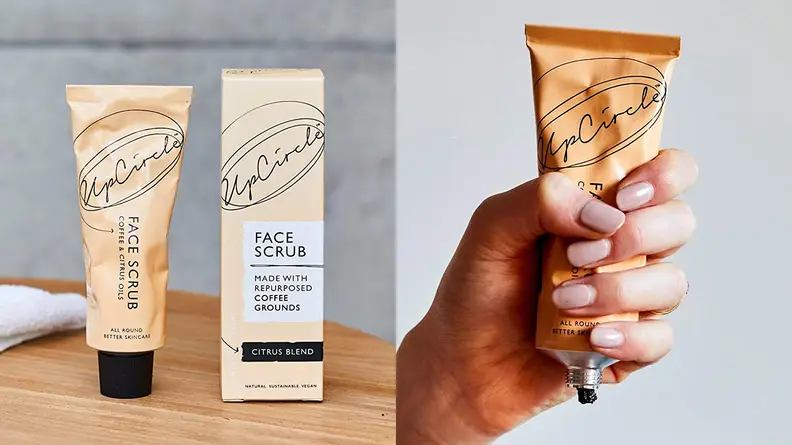 On the left: A tube of UpCircle face scrub on a table. On the right: A hand squeezing a tube of face scrub.