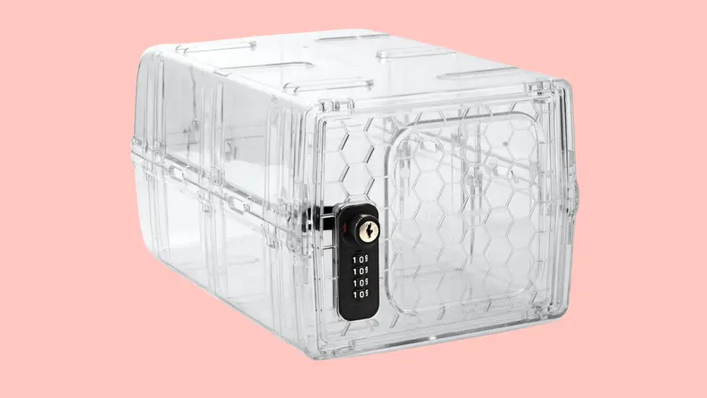A clear Urban August lockbox on a pink background.