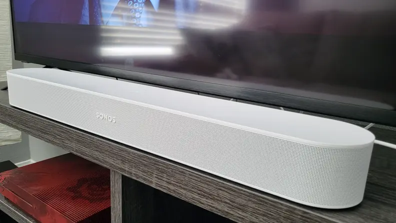 The Sonos Beam Gen 2, sitting in front of a TV