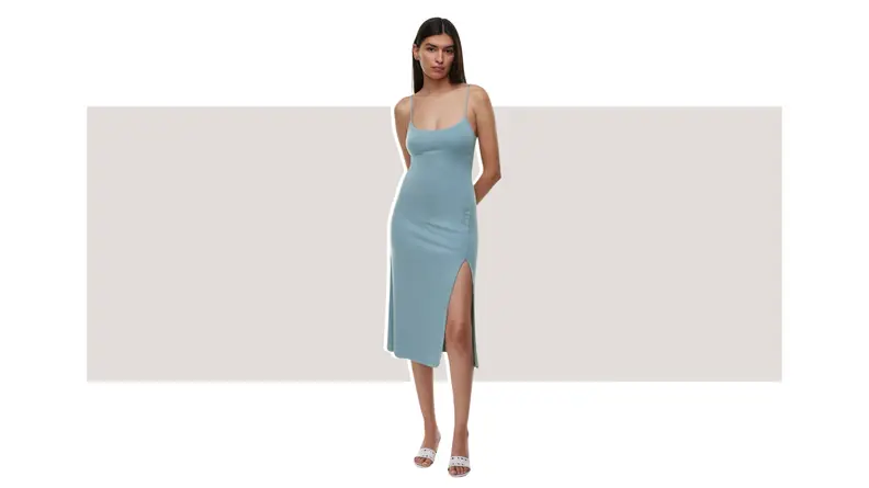 A model wearing a pale blue dress.
