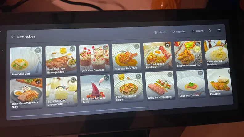 Digital screen filled with small pictures of food on the Typhur Sous Vide Station.