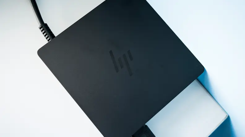 A closeup of the HP Envy's external power supply