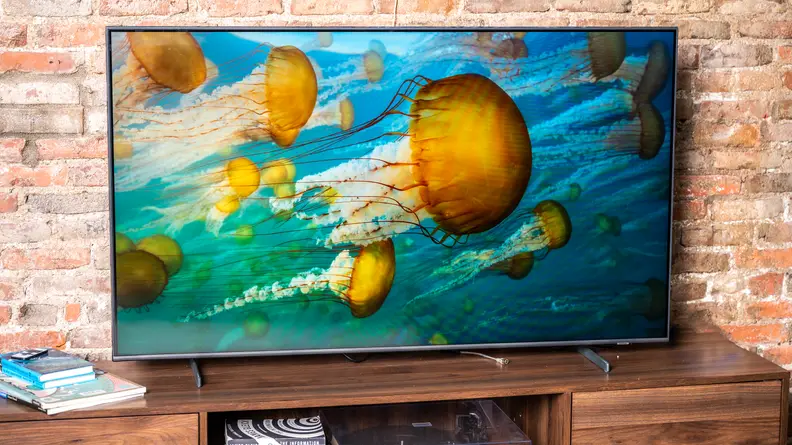 The Samsung Q60B displaying 4K/HDR content in a living room setting