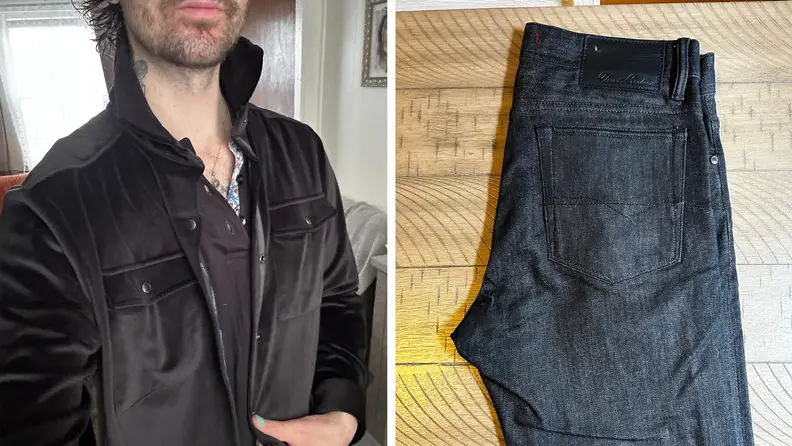 Selfie of a man wearing a black velvet shirt and black distressed denim jeans.